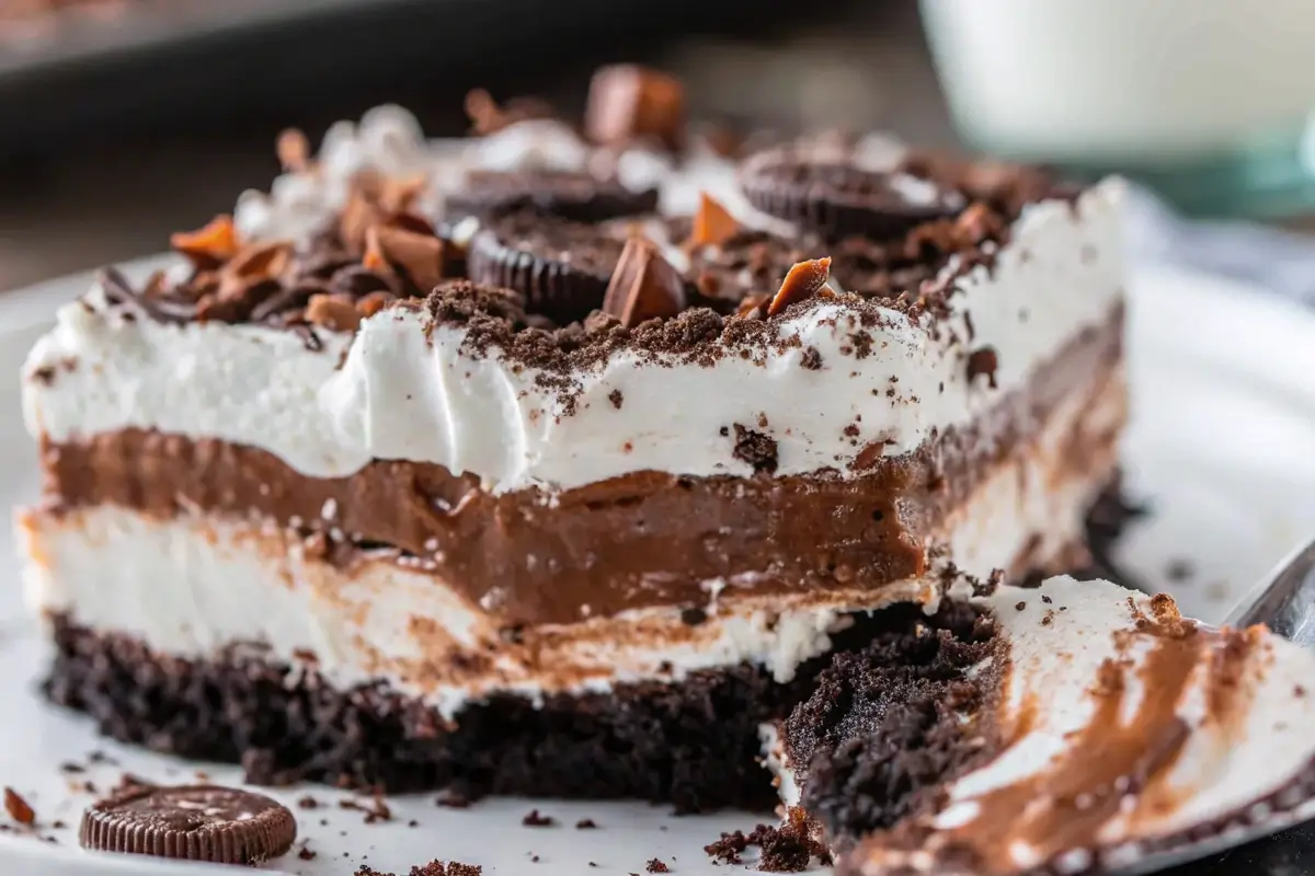 Chocolate lasagna dessert with layered cream and chocolate.